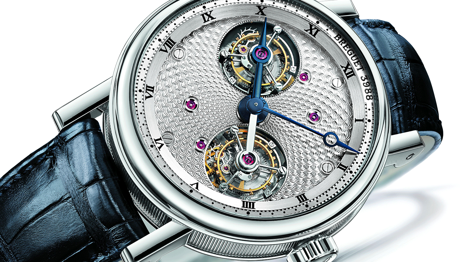 The spectacular outcome of years of diligent development, the Breguet Double Tourbillon includes a hand-wound movement fitted with a pair of tourbillon regulators rotating on the hour axis.